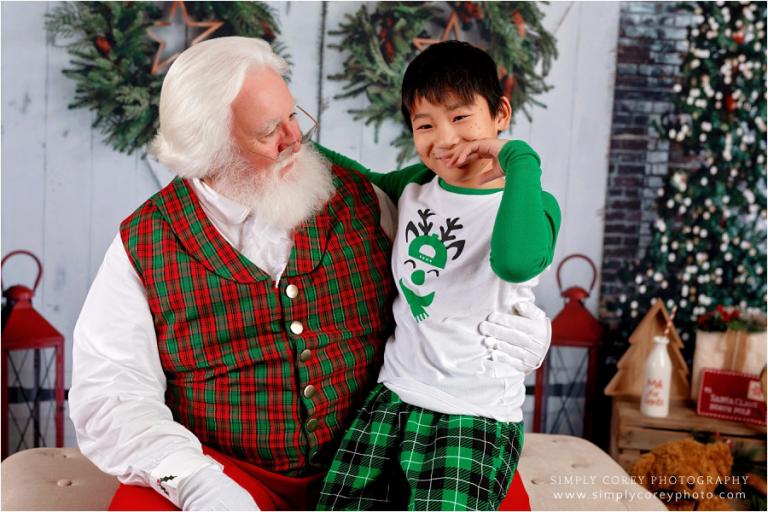 Villa Rica Santa Claus mini sessions, shy boy talking to Santa