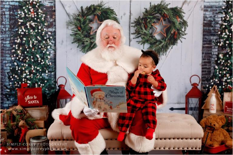 Santa Claus mini sessions near Douglasville, Santa reading book to baby