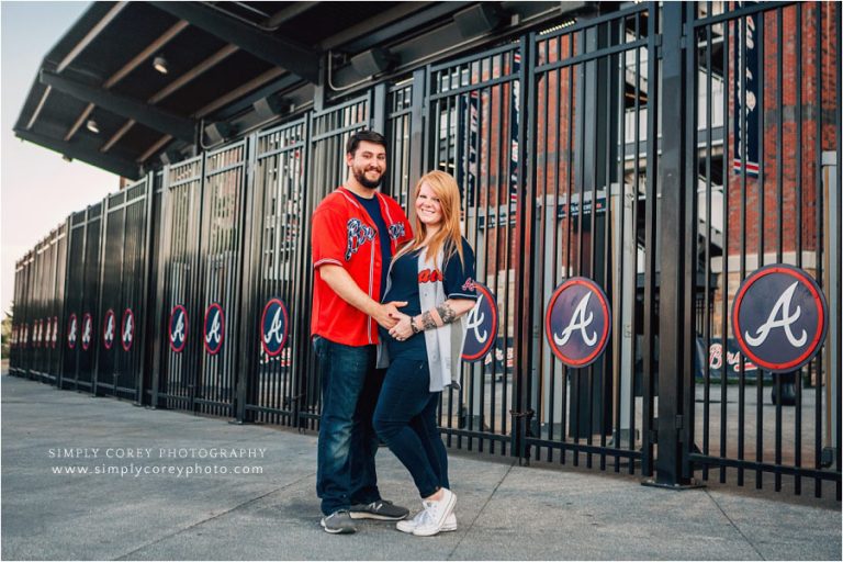 Atlanta maternity photographer, couple in Atlanta Braves jerseys