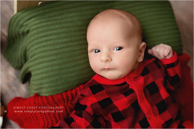 Villa Rica newborn photographer, baby in Christmas pajamas