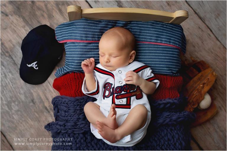 West Georgia newborn photographer, baby in Atlanta Braves onesie