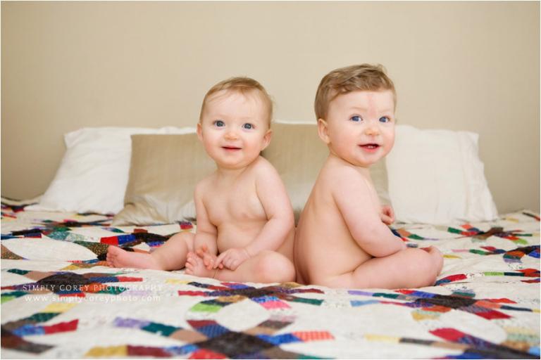 Atlanta baby photographer, fraternal twins on a bed with quilt