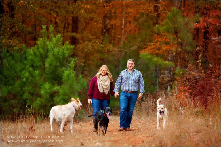 Atlanta pet photographer, couple walking three dogs in the fall