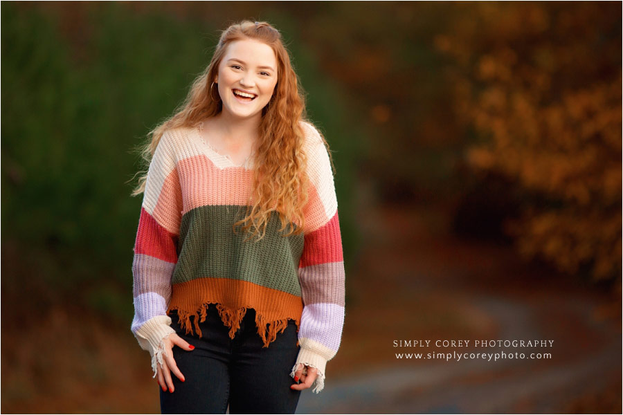 Peachtree City senior portrait photographer, teen laughing outside