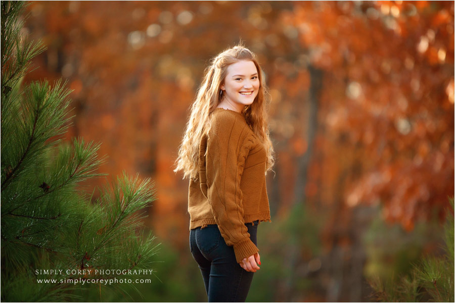 Villa Rica senior portrait photographer, teen girl outside with fall trees