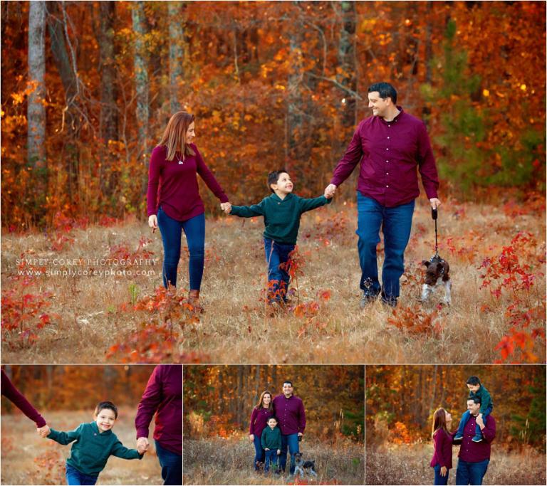 Villa Rica family photographer, walking in a fall field with a dog