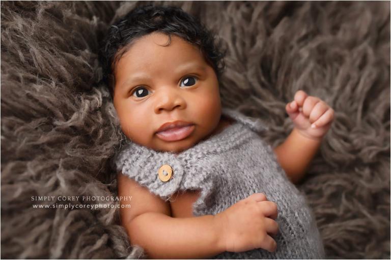 Bremen newborn photographer, baby boy in knit overalls