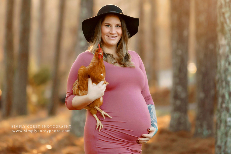 Douglasville maternity photographer, expecting mom holding a chicken