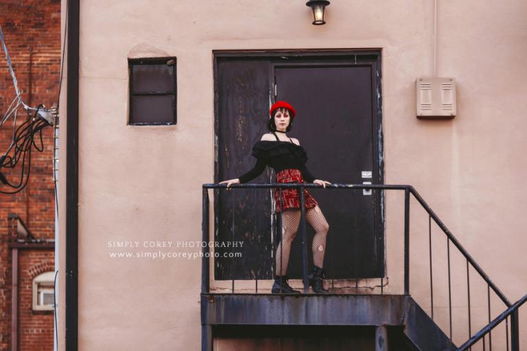 Carrollton photographer, girl on downtown stairs for fashion shoot