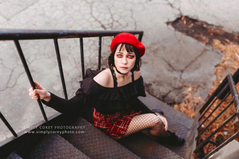Newnan photographer, girl in red makeup on stairs downtown