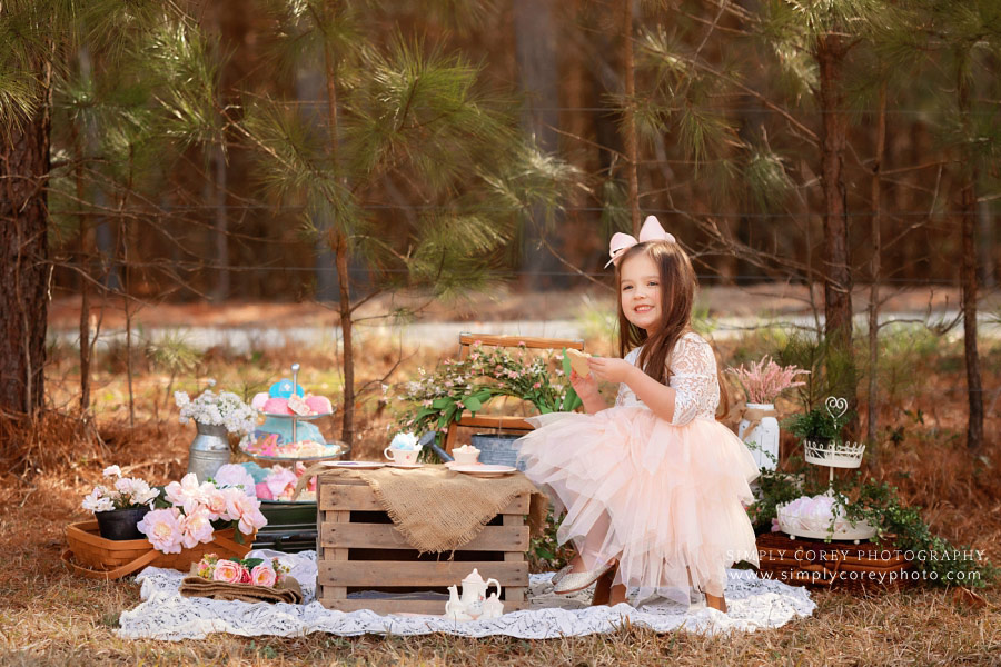 Carrollton, Georgia photographer; child having tea party outside