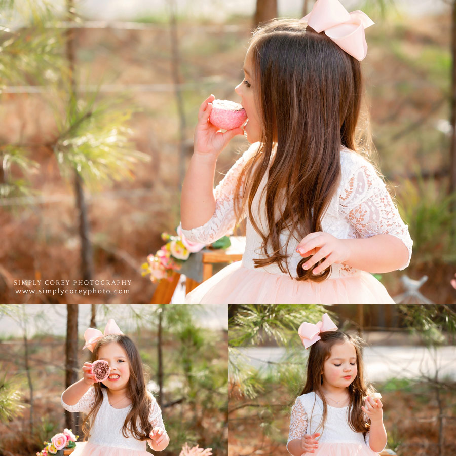 Newnan children's photographer, girl eating treats at outdoor tea party
