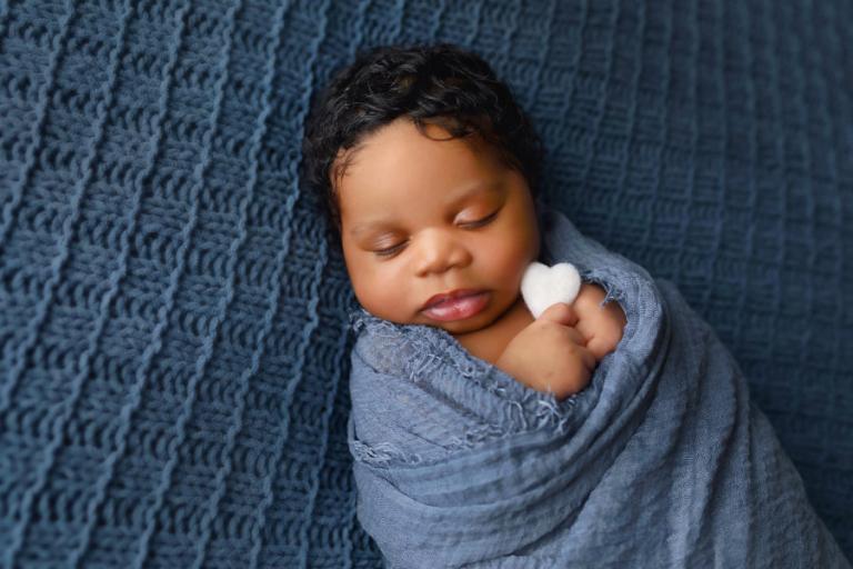 Douglasville newborn photographer, baby boy in blue with heart