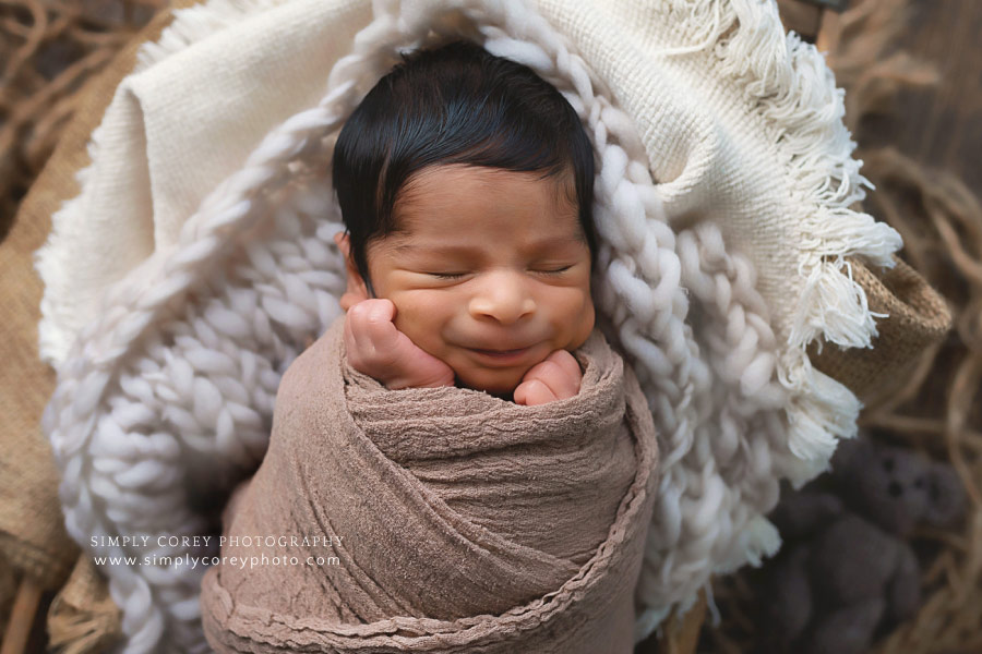 Atlanta newborn photographer, baby boy smiling in neutral layers