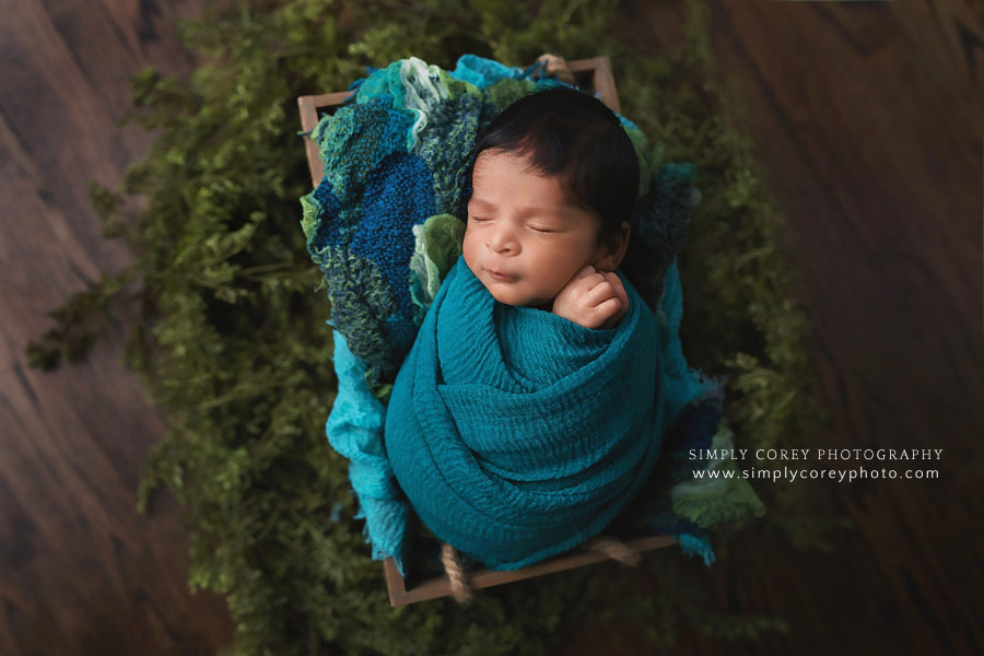 newborn photographer near Atlanta, baby boy in blue and green