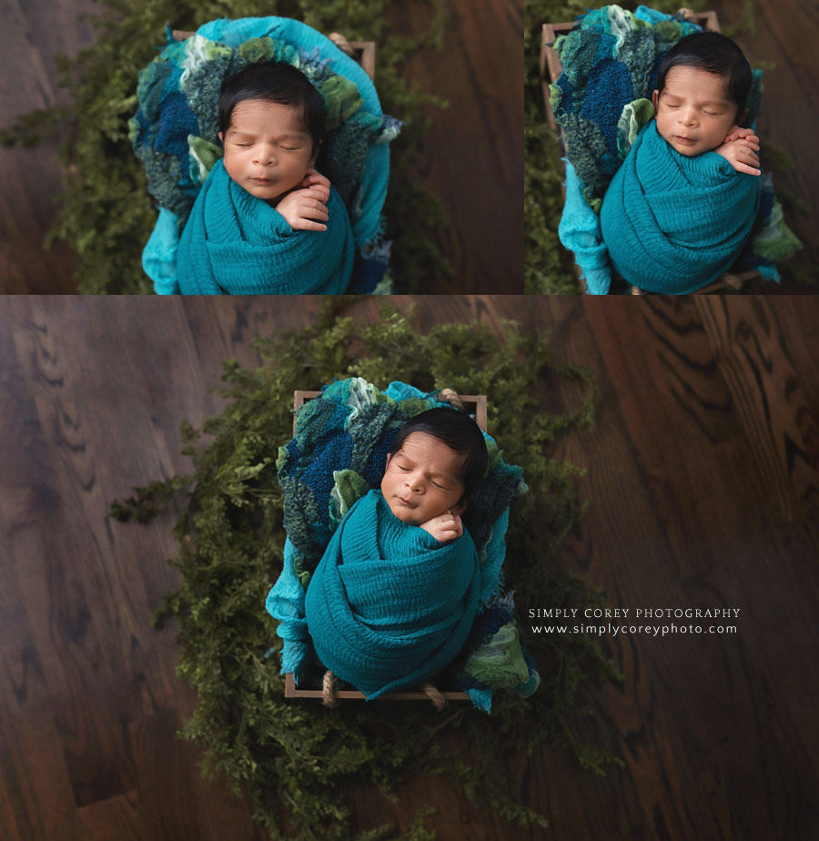 Newnan newborn photographer, baby boy in green, blue, and teal