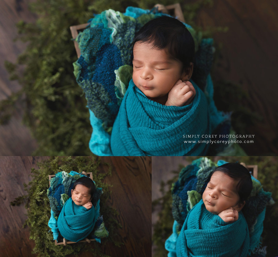 Villa Rica newborn photographer, baby boy swaddled in blue