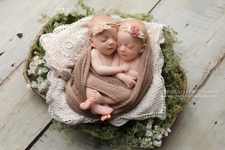 newborn photographer near Atlanta, twin baby girls in a basket with flowers