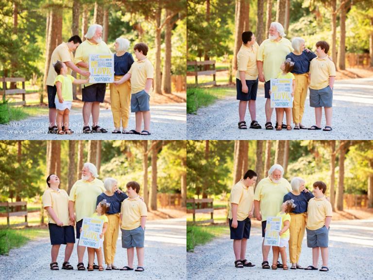 Carrollton family photographer, grandparents and grandkids outside on dirt road