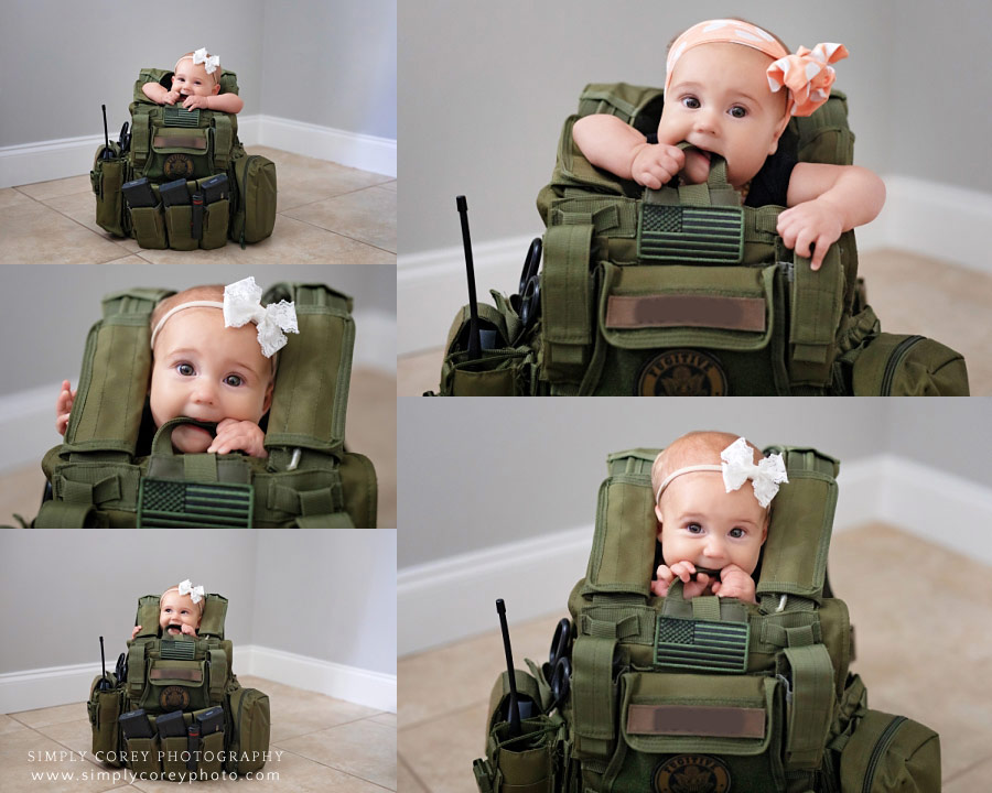 Newnan baby photographer, girl sitting in tactical vest during in-home session