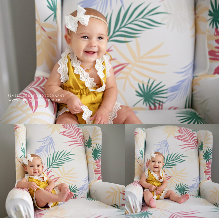 Newnan lifestyle photographer, baby girl smiling in a chair at home