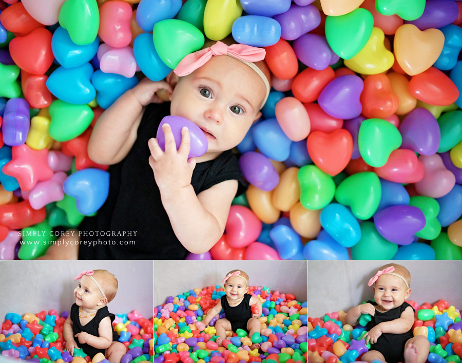 Villa Rica baby photographer, lifestyle photography in a colorful heart ball pit
