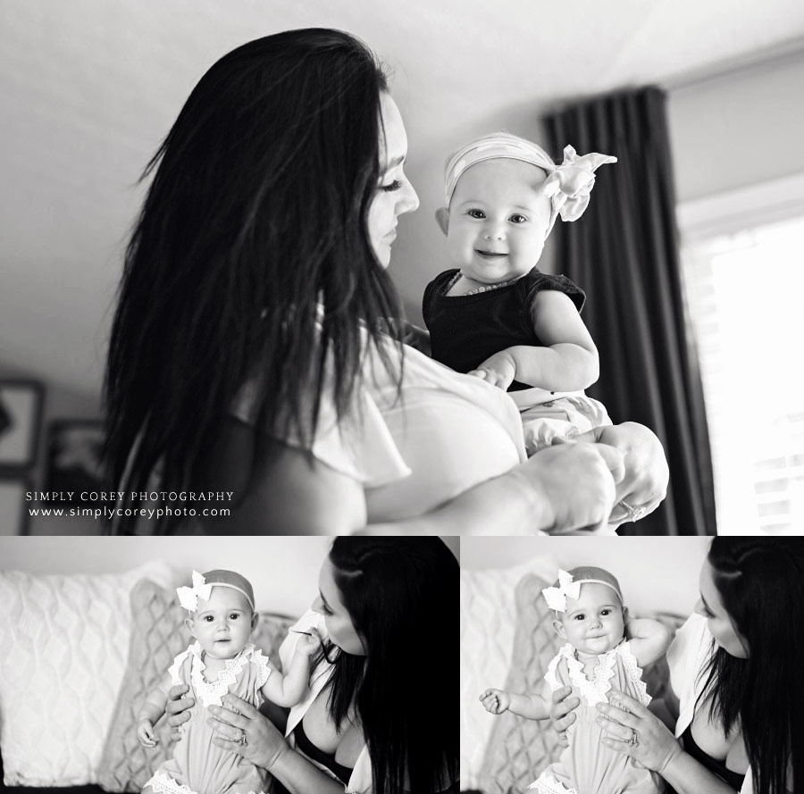West Georgia lifestyle photographer, mom holding baby girl at home