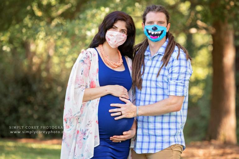 Atlanta maternity photographer, expecting couple wearing masks to document 2020 and covid