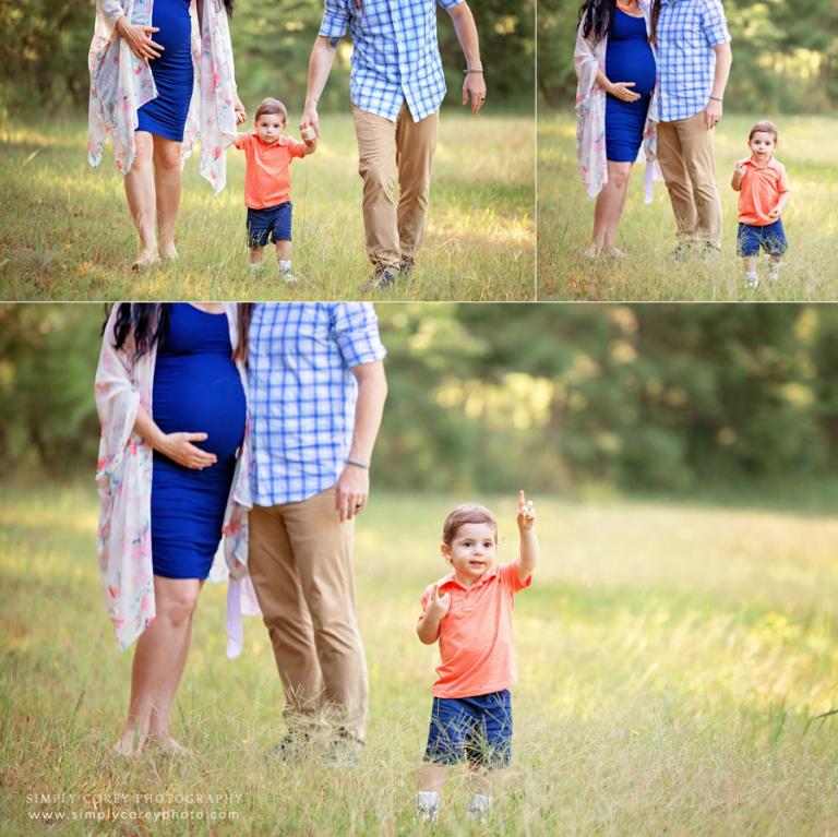 maternity photographer near Carrollton, GA; family outside in field with toddler