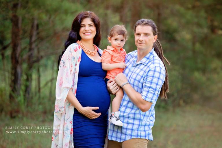 Villa Rica family photographer, maternity session with a toddler outside