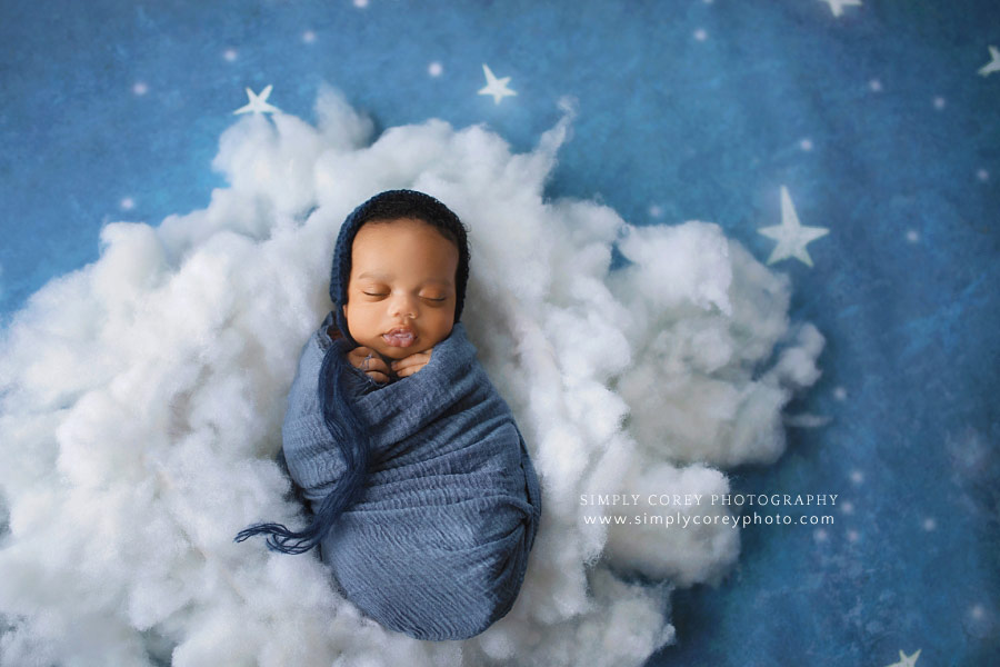 Douglasville newborn photographer, baby boy in blue on cloud with stars