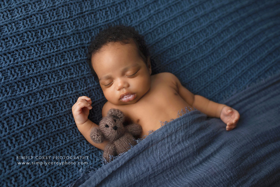 newborn photographer near Peachtree City, baby boy in blue sleeping with teddy bear