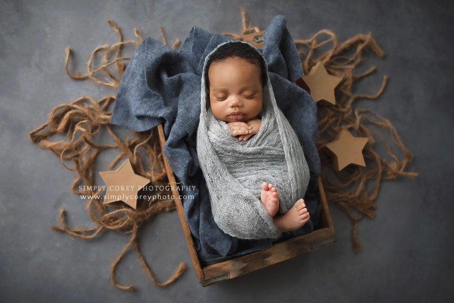 Newnan newborn photographer, baby boy in grey and brown set with stars