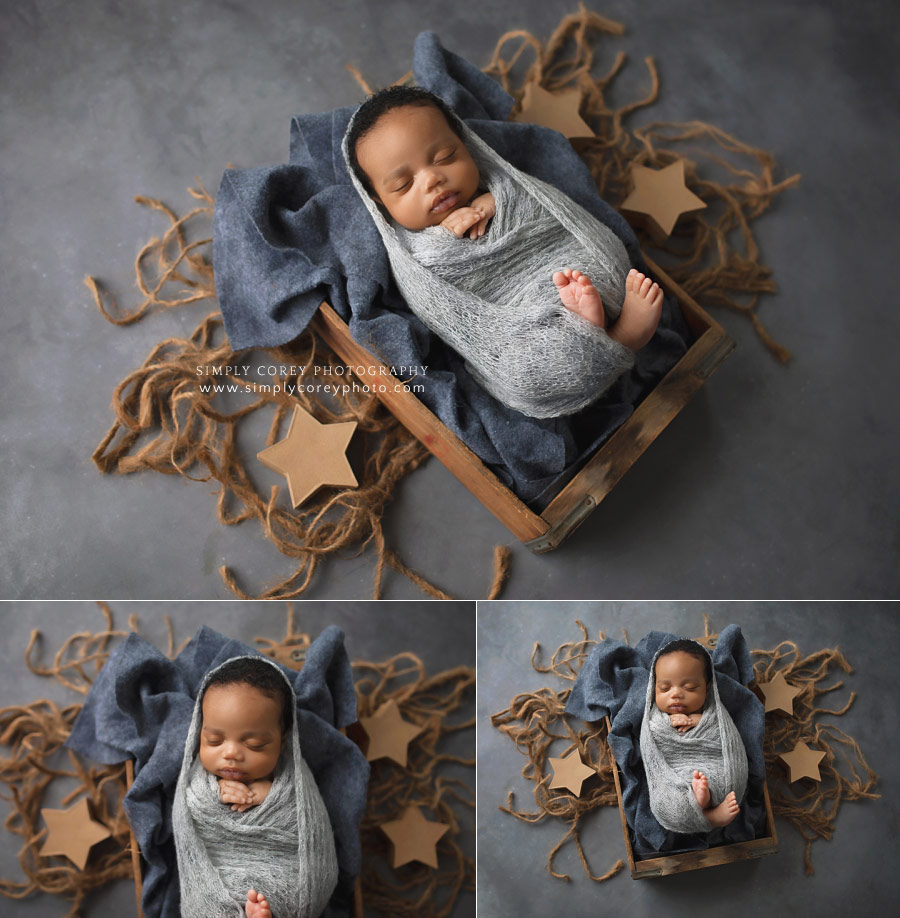Villa Rica newborn photographer, baby boy swaddled in crate with stars