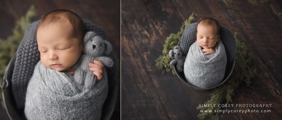 Atlanta newborn photographer, baby boy in bucket holding teddy bear