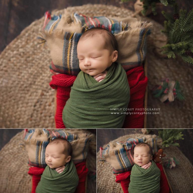 Douglasville newborn photographer, baby boy on Christmas bed