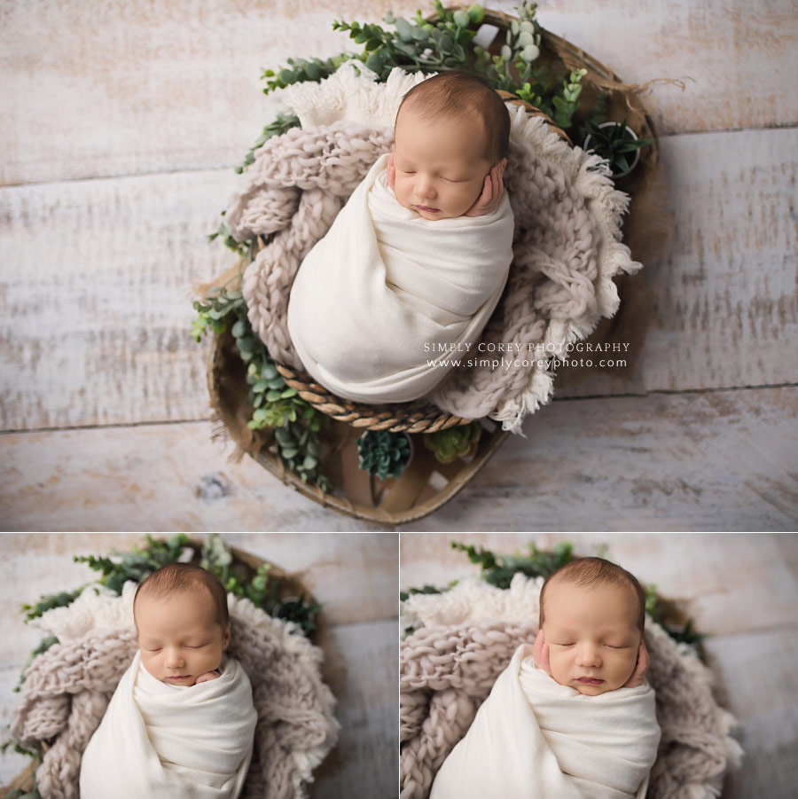 newborn photographer near Douglasville, baby boy in light neutral wrap and textures