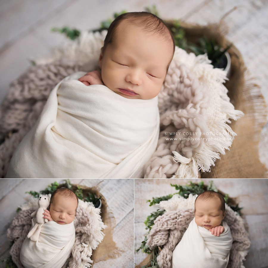 Peachtree City newborn photographer, baby boy in ivory with greenery