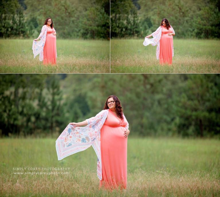 maternity photographer near Douglasville, mom in coral dress waving a kimono in a field