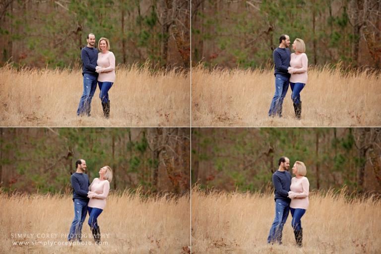 engagement photographer near Dallas, GA; couple outside in field in winter
