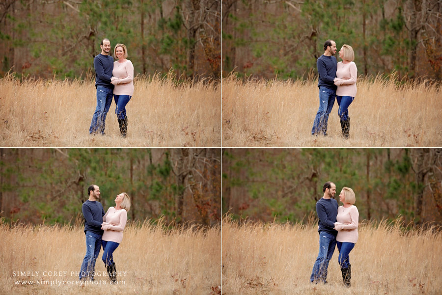 engagement photographer near Dallas, GA; couple outside in field in winter