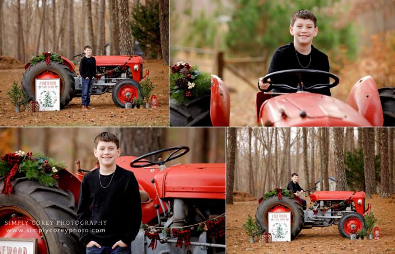 mini session photographer near Carrollton, GA; child on Christmas tractor