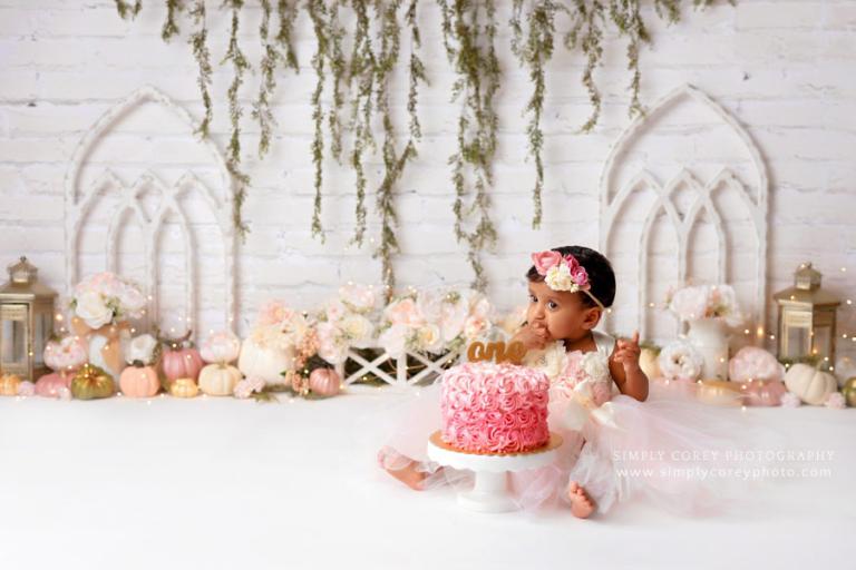 cake smash photographer near Carrollton, GA; pink pumpkin set with ombre cake