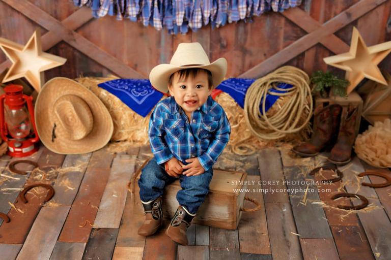 baby photographer near Carrollton, GA; studio session with rodeo theme for a one year old