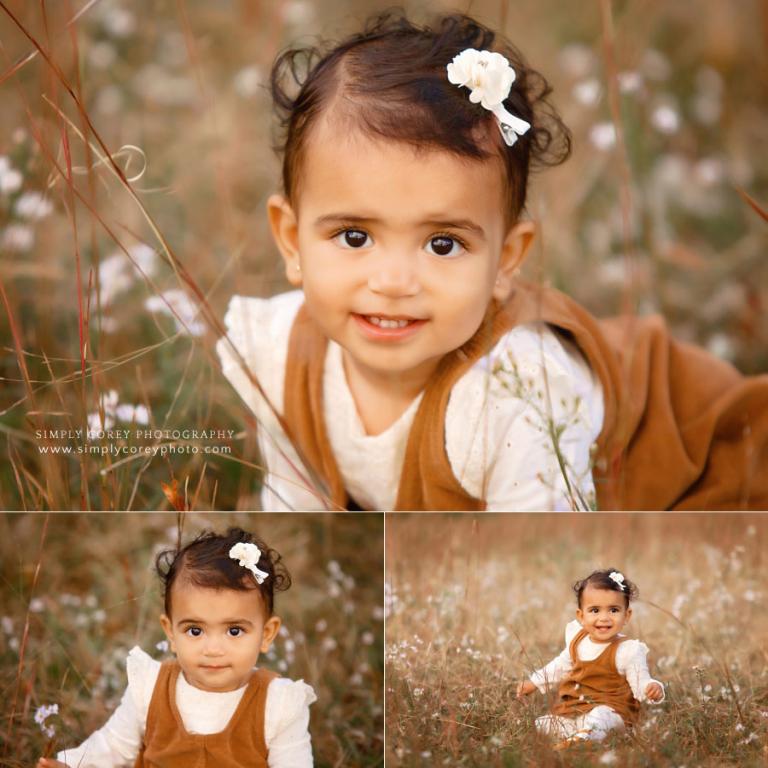 baby photographer near Peachtree City, toddler outside in field with flowers