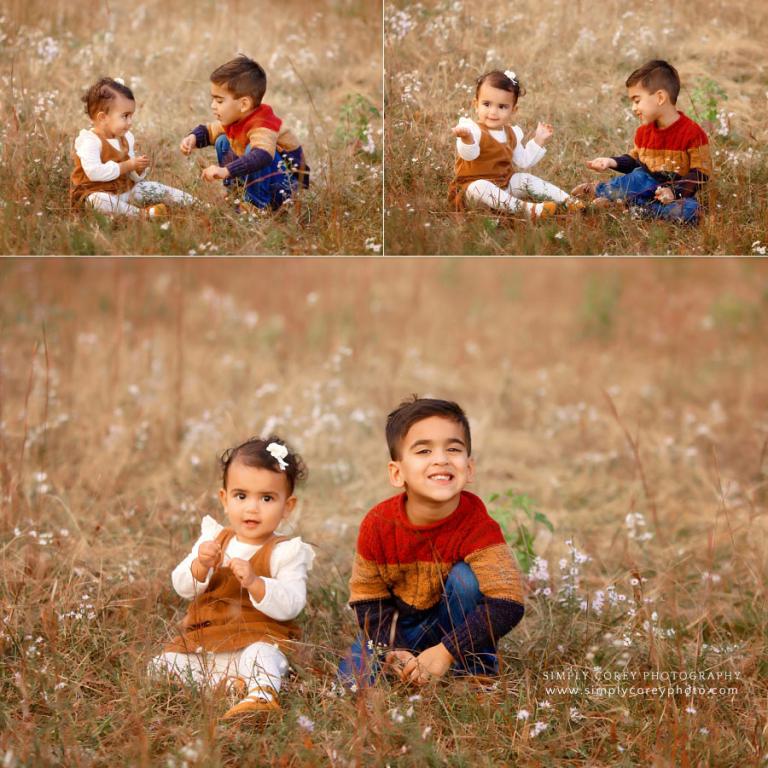 Hiram family photographer, fall portraits of children sitting in field