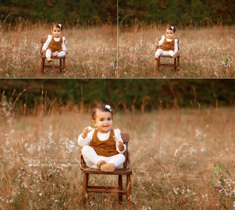 Newnan baby photographer, toddler girl in chair outside in field