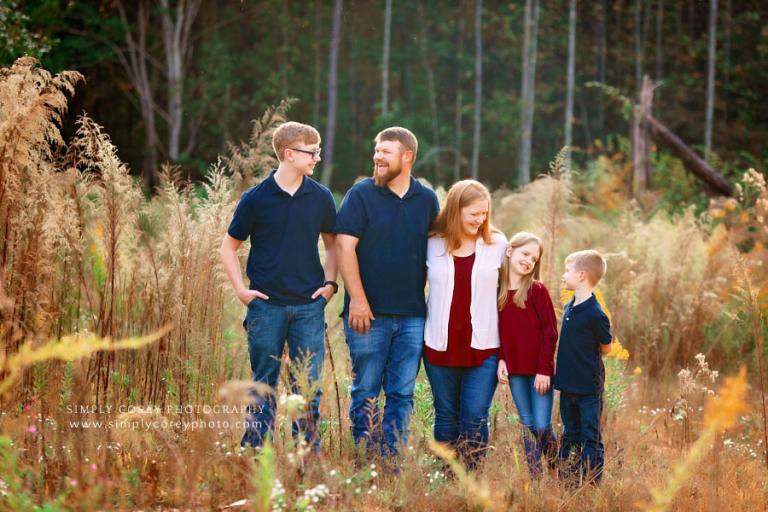 Atlanta family photographer, on location session in field with tall grass