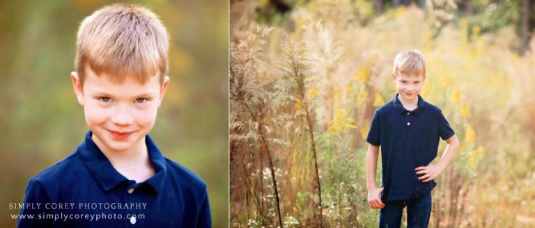 Carrollton, GA photographer; child outside in field with tall grass