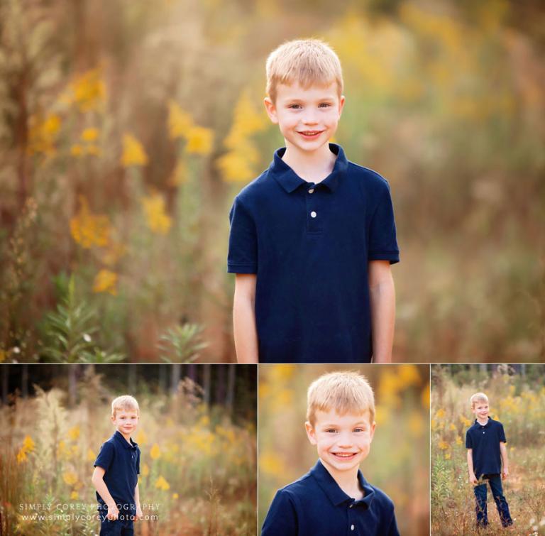 Newnan photographer, child outside in field with tall grass and yellow flowers